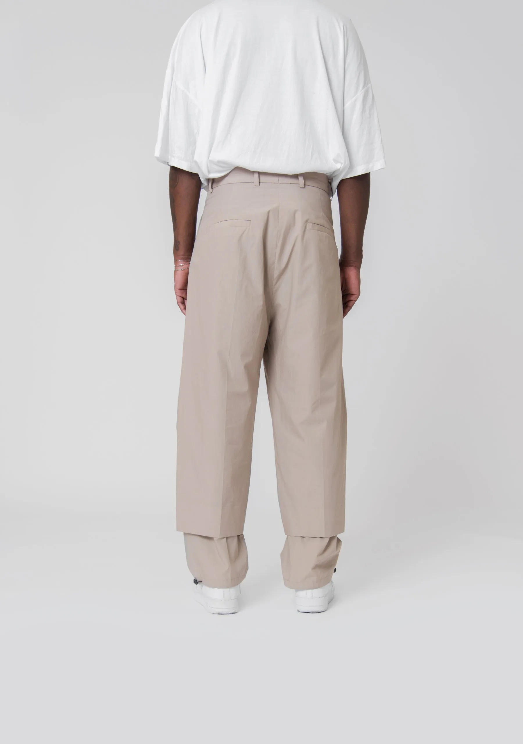 Sure! Here’s an optimized title for the e-commerce product:

Beige Double Hem Trousers for Women – Stylish & Comfortable Casual Pants

Let me know if you need any further assistance!